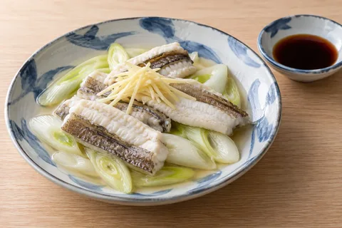 開きの酒蒸し・しょうが添えのAI生成イメージ